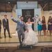 Newlyweds Throw Arms Up in Celebration of Their Nuptials