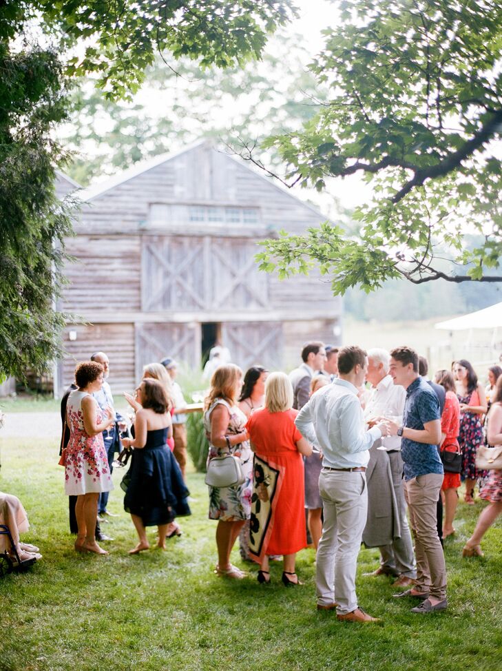 Guests Enjoying Charcuterie and House-Made Pickles During Cocktail Hour