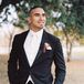 Elegant Black Suit With White Tie