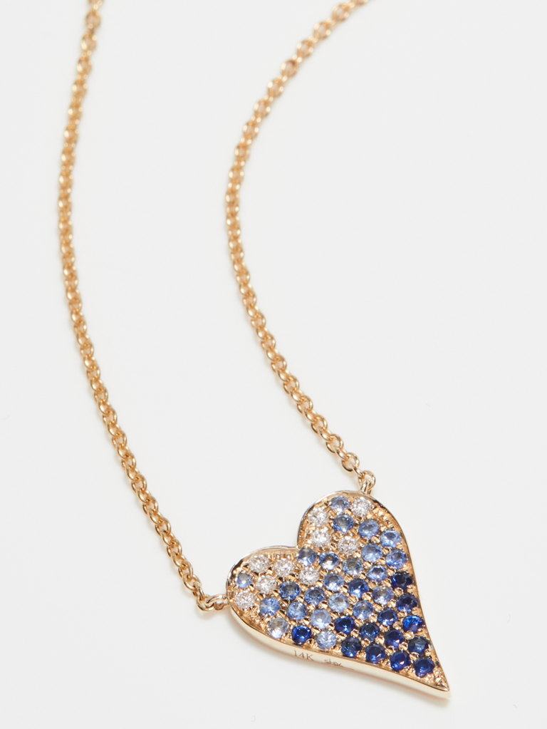 Gold set heart pendant necklace with ombre blue sapphire stones