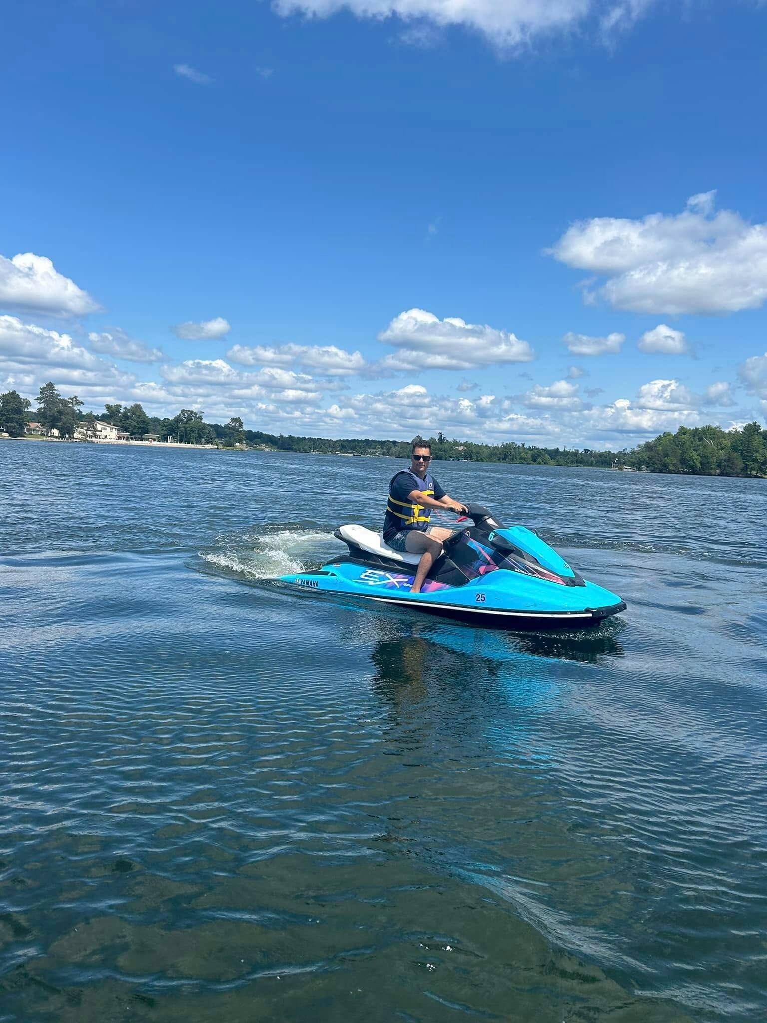 Issam's first time enjoying the Minnesota summer lake life.