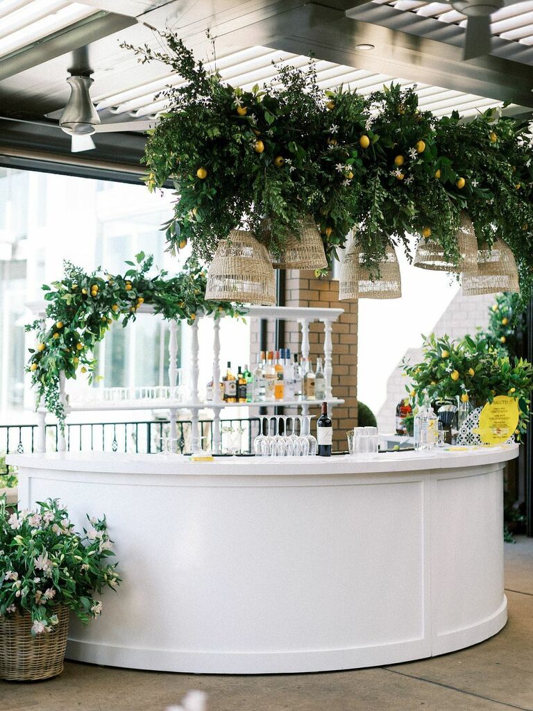 White curved bar counter for indoor-outdoor wedding reception