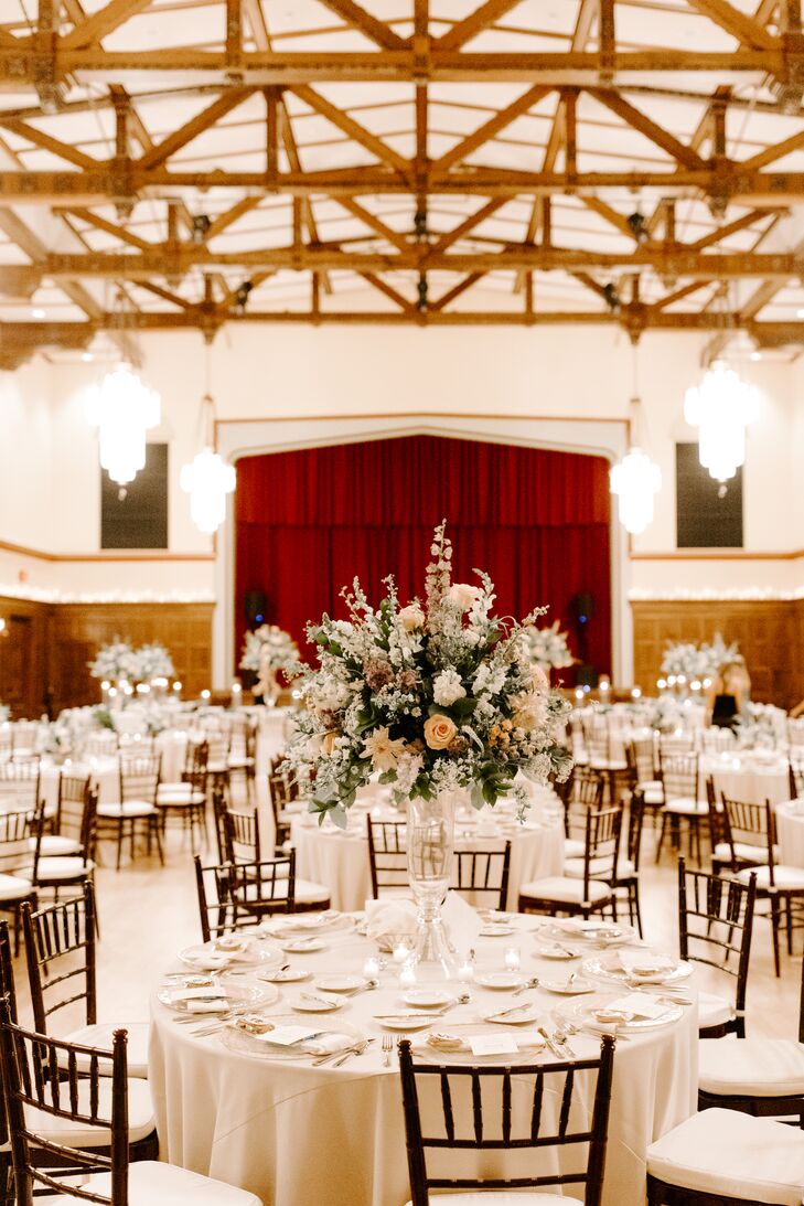 White Reception Tables with Tall Centerpieces