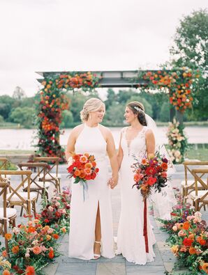 Brides Holding Hands at Waterfront Ceremony