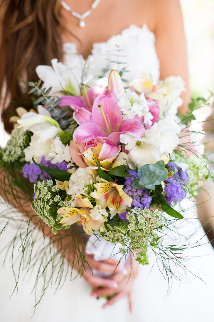 The bridal bouquet embodied some of the beautiful pastels, made up of blooms that ranged from various lilies to hydrangeas and Queen Anne's lace.
