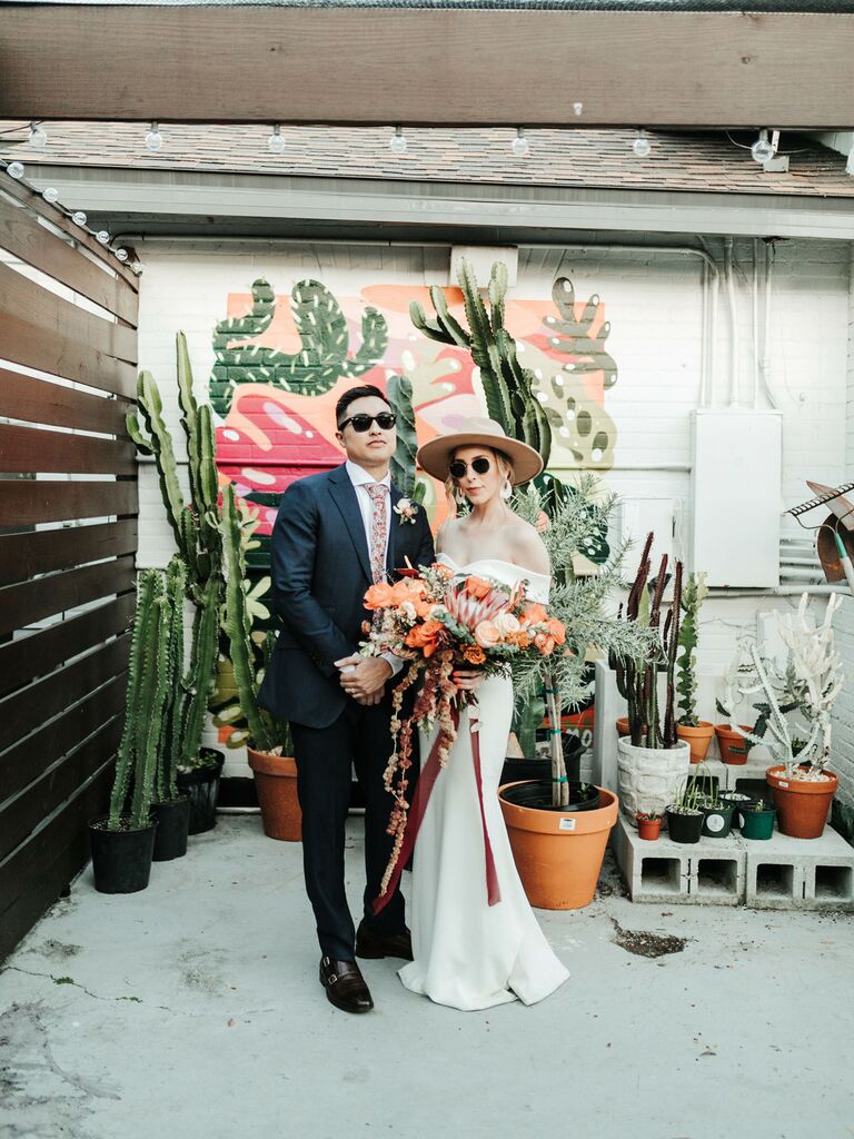 how to choose wedding vendors/couple in sunglasses