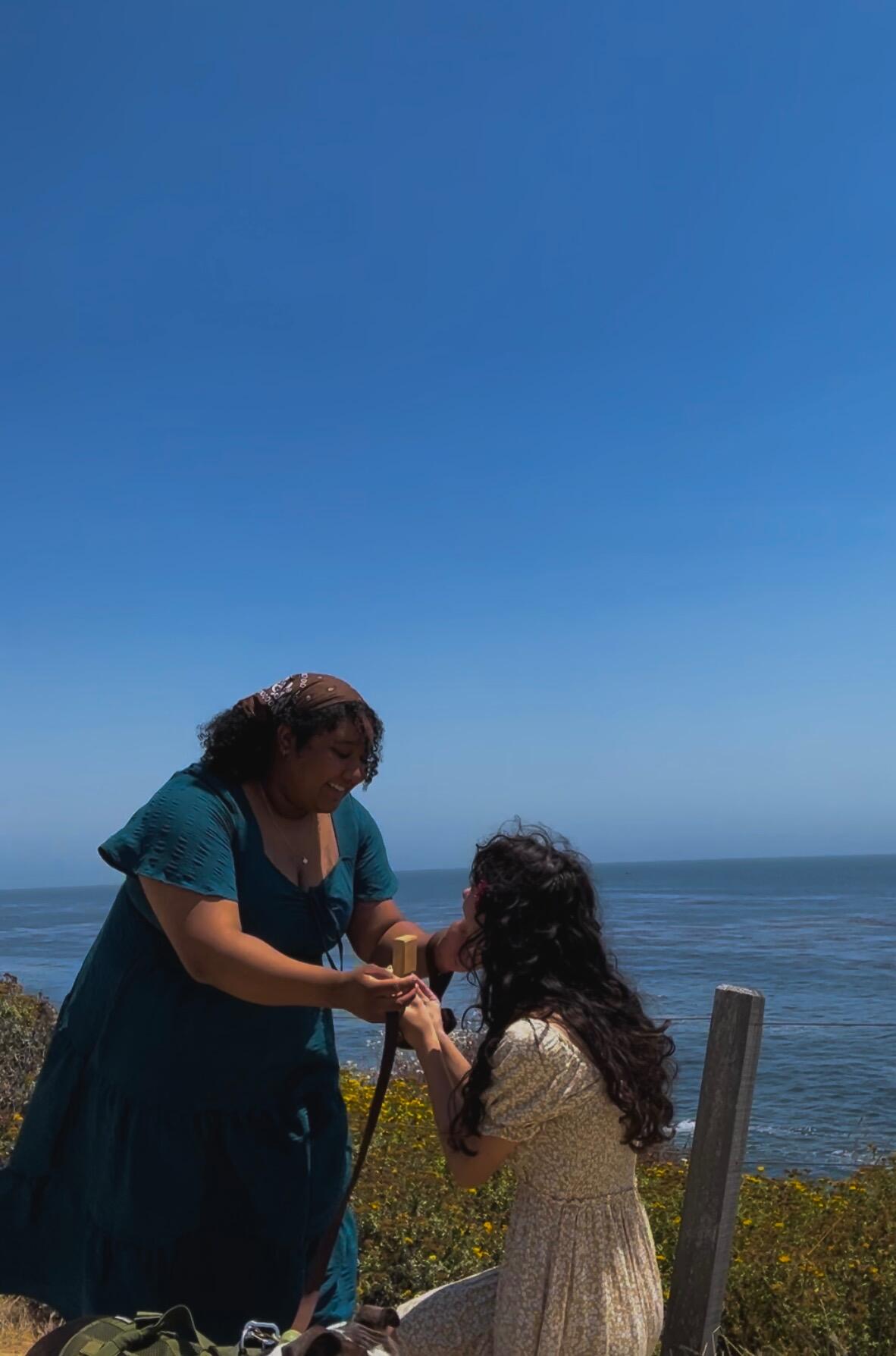 In the summer of 2024 Gabbi proposed with a perfect day at home and a beautiful dinner. A couple weeks later Marissa proposed right back on the bluffs in Santa Cruz. Now officially engaged, we began the wedding planning journey! 
