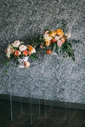 Blush, Ivory and Peach Arrangements Accented by Fruit on Acrylic Stands
