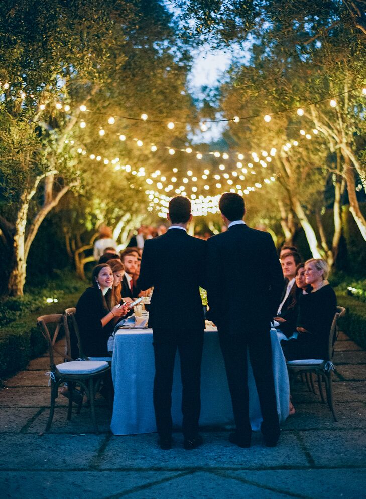 Brad and Michael made a point to stick together all night instead of splitting up. "One of our fondest memories was peeking out of a window, high above the crowd, and watching our guests enjoy themselves," Brad says. "We were overcome with emotion when we realized it was our love that brought everyone together to celebrate with us."
