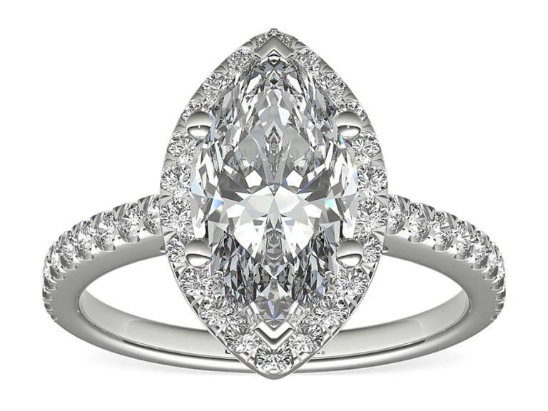 Marquise diamond center with marquise round diamond halo on silver band with round diamonds