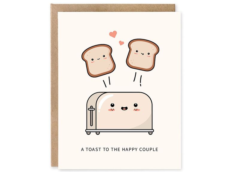 'A toast to the happy couple' in black minimalist type with cuter toaster and toast pieces graphics on light blush background
