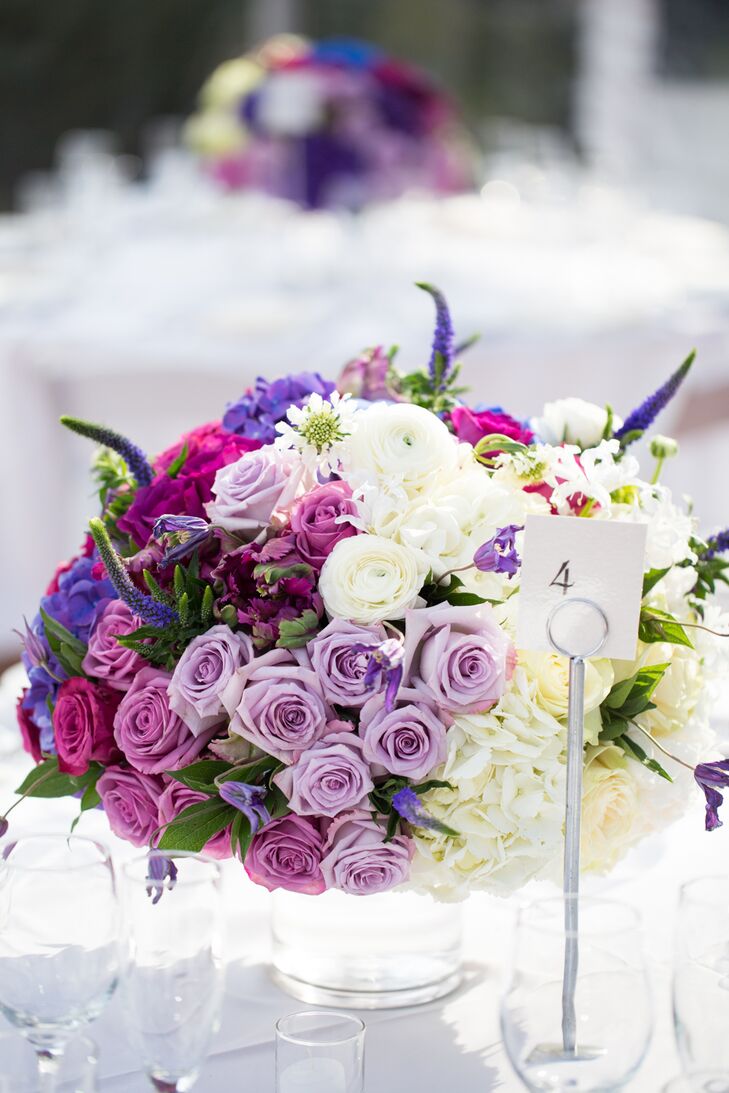 "The intent was to keep the ombre theme, but incorporate both blues and purples in various shades, fading to white," Lisa says. "Anthony used mostly hydrangeas along with a range of flowers in shades including blues, purples, fucshia and greens."