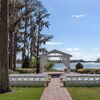 The Lake Around Cypress Grove Estate House in Orlando, Florida, Served as This Wedding's Backdrop