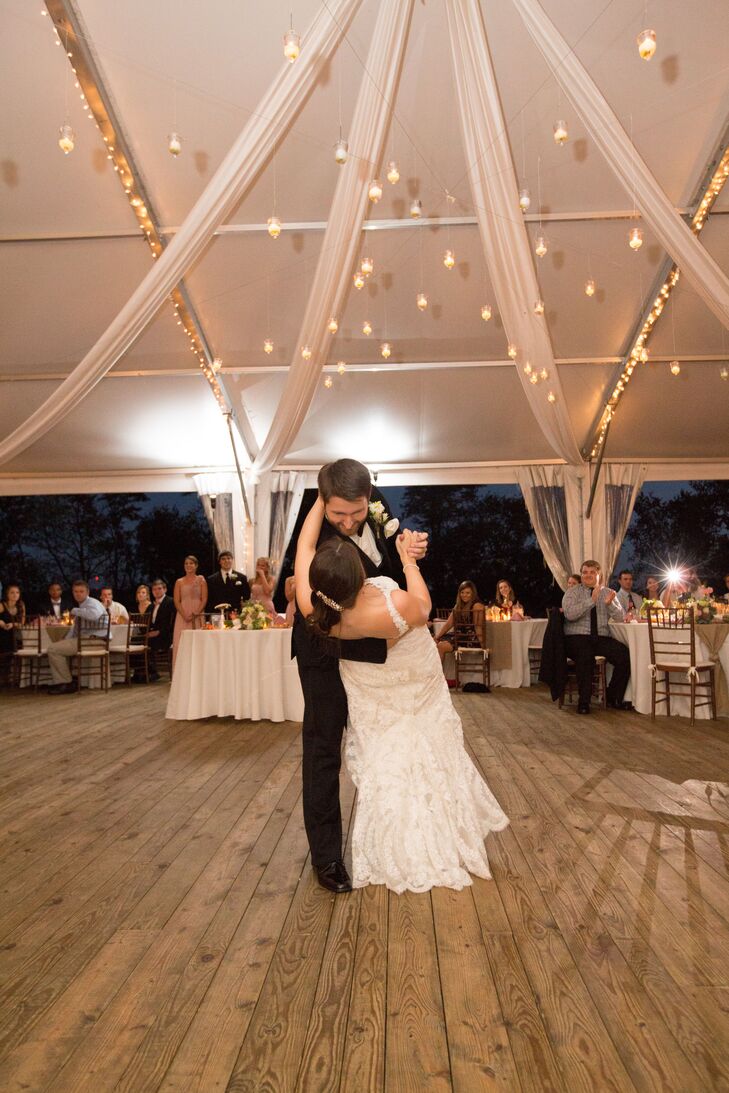 Brittany and Seth's florist provided votive candles that could be hung from the tent's canopy, which added a romantic touch.