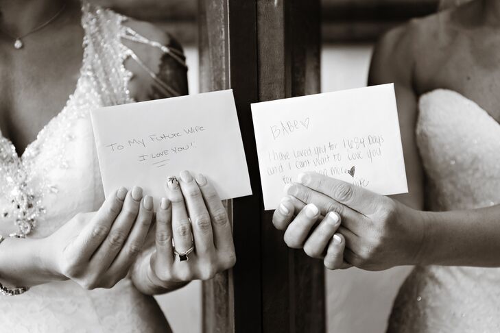 On their wedding day, the brides did a "first touch," where they exchanged sentimental love letters while separated by a divider.