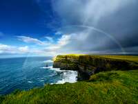 Rainbow above Cliffs of Moher. Ireland