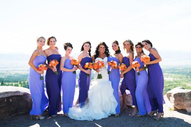 The bridesmaids wore two different shades of purple dresses designed by Dessy.