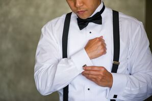Groom in Black Bow Tie and Suspenders