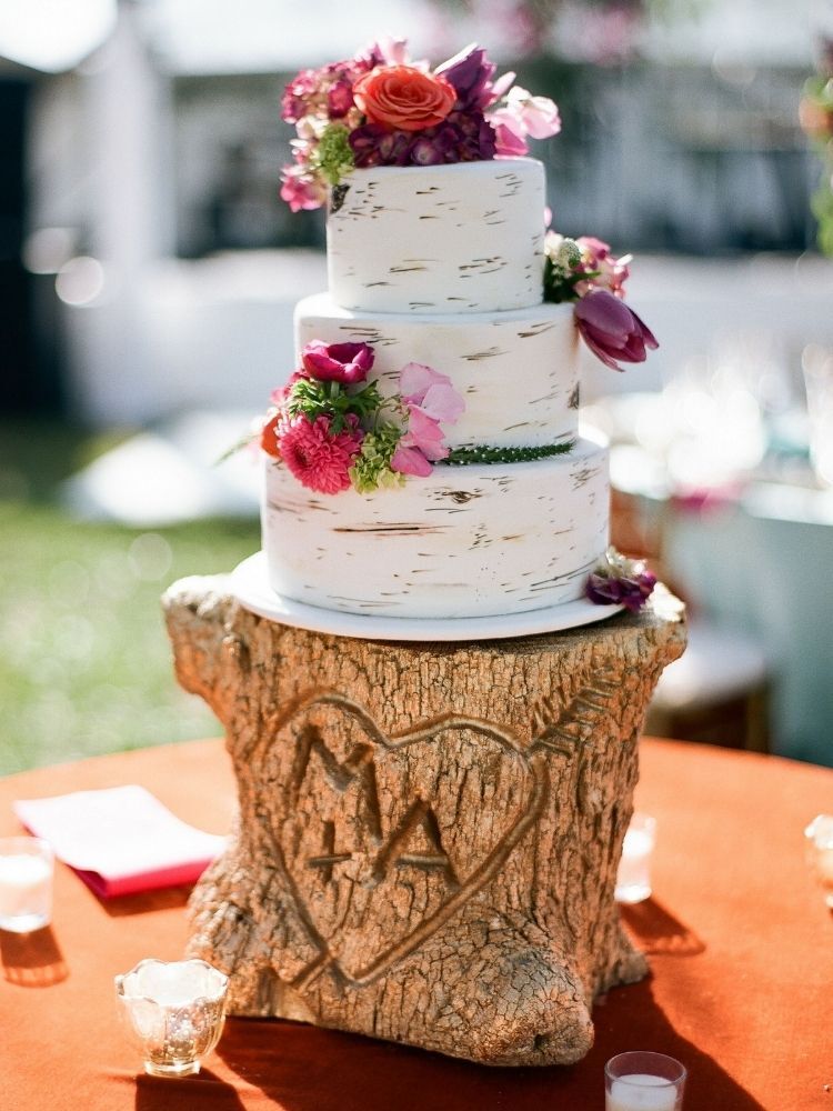 wood-inspired cake on tree stump cake stand