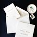 Minimal Invitation Suite with Gold Typography and Art Deco Envelope Design