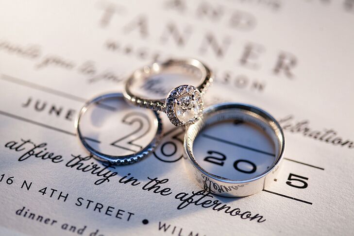 Tanner designed Christi’s engagement ring after purchasing an oval-cut diamond that he knew was her favorite. The bride’s fingerprint is engraved on the inside of the groom’s wedding band, along with the phrase “I’ll come running.”