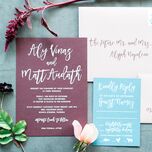 Calligraphed wedding invitation suite with properly addressed envelope