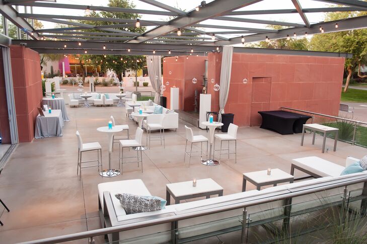 The patio overlooking the park, where Brianna and Ryan’s cocktail hour took place, offered plenty of modern lounge furniture and space to mingle as guests snacked on appetizers and sipped beverages such as the red berry sangria signature cocktail.