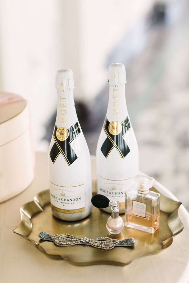 Silje and Tommy left no detail overlooked, even for the preceremony events. While Silje and her bridesmaids got ready, they sipped on Moet champagne. The bottles fit in perfectly with the day’s theme and palette, bearing sleek white and gold labels.