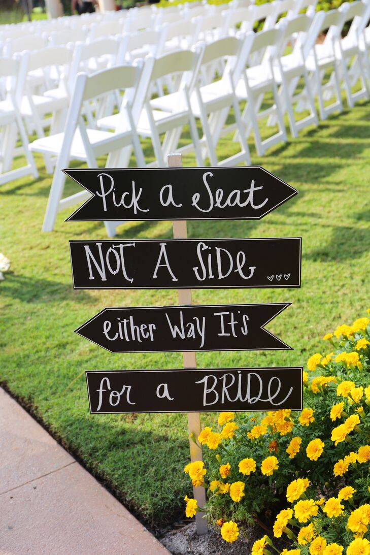 At the ceremony site, handmade signs included a welcome sign that directed friends and family to sit where they please.