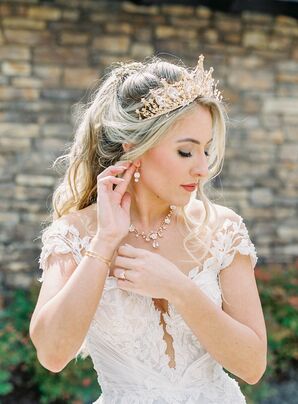 Bride in Ornate Gold TIara, Drop Earrings, Necklace and Romantic Gown