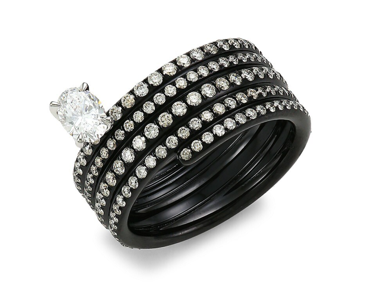 Stacked pave diamond black band with oval diamond center stone at top