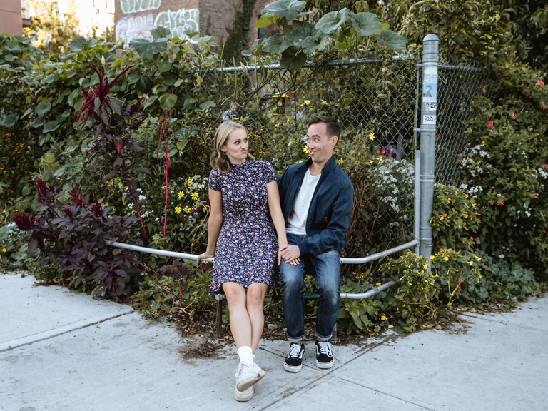 Couple looks at each other while making silly faces. 