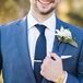 Even the groom stuck with a "something old" mantra  by pairing used cuff links with a blue suit, wine-colored Aldo shoes (something new) and a gold wristwatch borrowed from his grandfather. "Girls aren't the only ones who get to have fun with the accessories," he says.