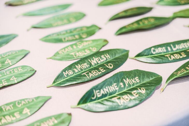 Talk about natural! The couple channeled their tree-filled setting with these place cards. All 90 guests found their names written in gold on actual leaves. The accents played into their theme and alluded to the couple’s succulent and tulip centerpieces inside Lakeside Clubhouse Wedding & Reception Facility in Medford, New Jersey.