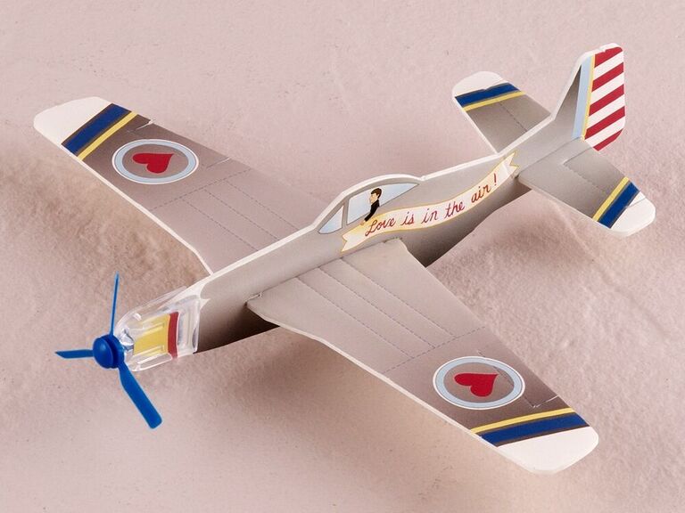 Paper airplane wedding favors