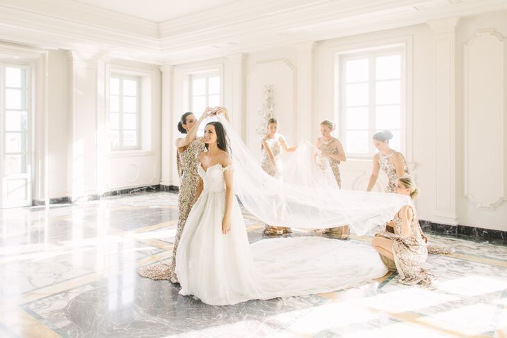 After doing her research to find the perfect dress, Silje decided to take the custom route. “Norway’s most talented wedding dress designer, Leila Hafzi, offered to custom-make the wedding dress of my dreams—and hats off to her—she definitely made my vision come to life,” Silje says. Silk fabric made the gown light as a feather, while an off-the-shoulder silhouette and handcrafted lace appliques gave Silje’s look a one-of-a-kind flair.