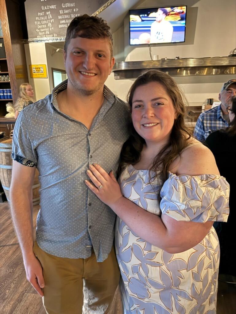 Now the biggest memory of Mitch and Emilee's story. The memory that leads us to the point of creating this website. On May 31st the day before officially moving into their new home, Mitchell got down on one knee as asked Emilee to marry him. And of course she said YES!