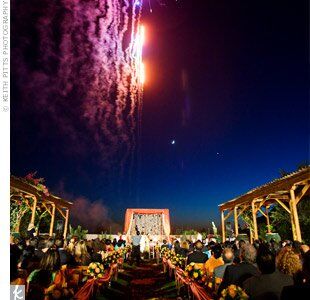 The couple's married life started with a bang! Fireworks lit up the sky right as they were pronounced husband and wife.