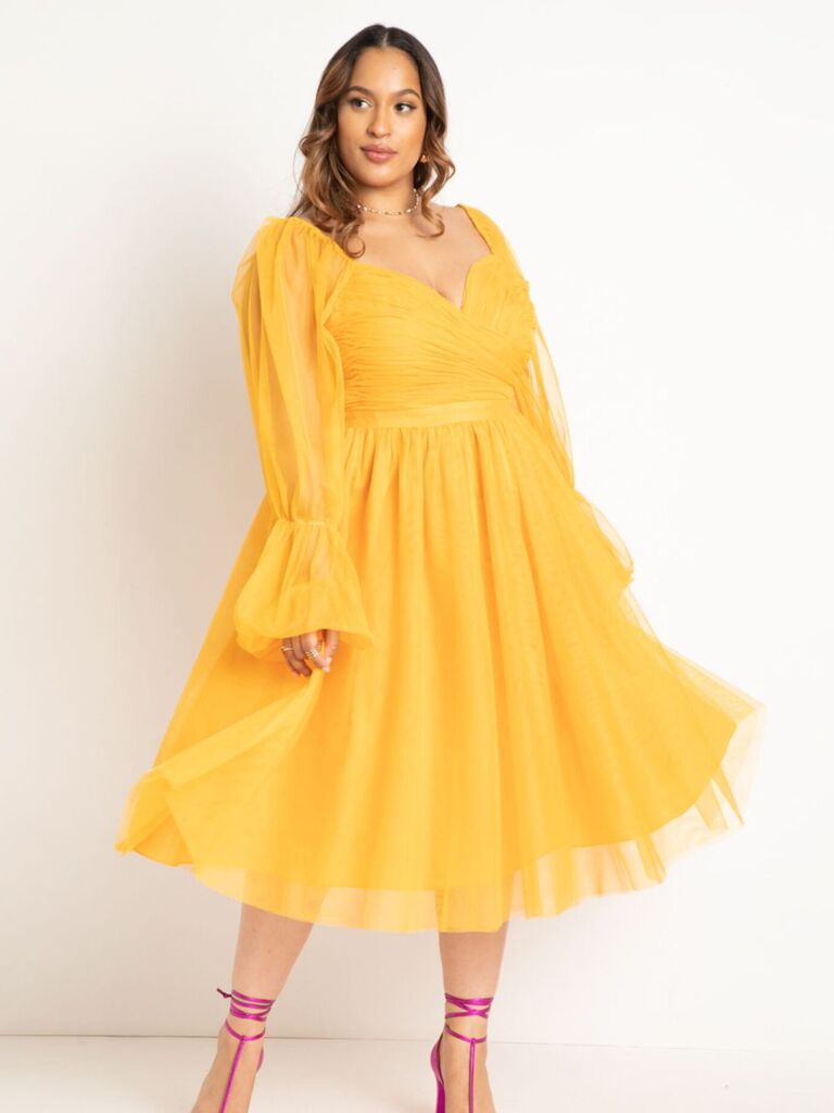Yellow wedding guest cocktail dress from ELOQUII