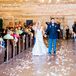 Music played an important role in Samantha and Chris's ceremony. Since they met when they were 17 years old, Chris walked down the aisle to "17 Again" by Eurythmics. Then Samantha walked down the aisle to "A Thousand Years" by Christina Perri. Together, they walked up the aisle to "This Will Be (An Everlasting Love)" by Natalie Cole.