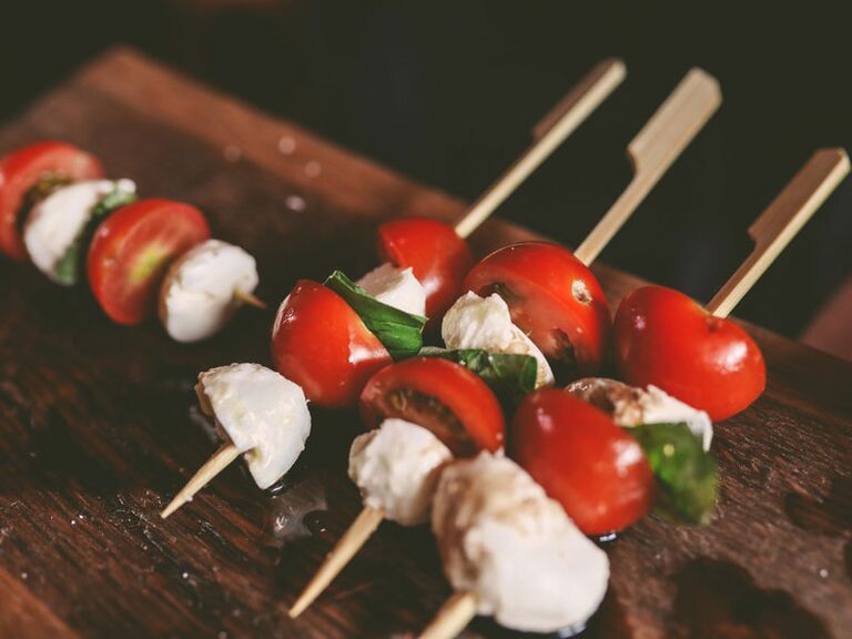 Tomato, mozzarella and basil skewers at bridal shower