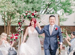 The vibrant, candy-apple red color palette Kayleigh and Vince chose for their wedding was fitting for multiple reasons. Including red in the wedding a