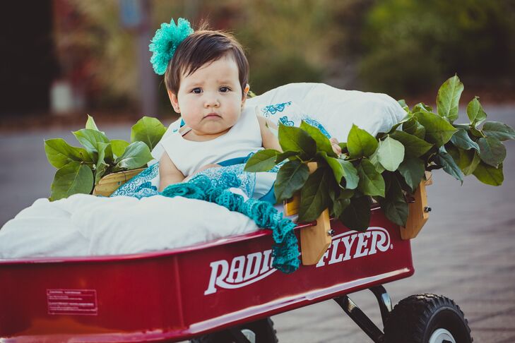 Young Girl in Red Wagon