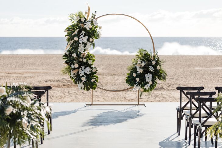 Mexico Beach Ceremony Above the Sand, Gold Circle Arch, Tropical Greenery, White Flowers