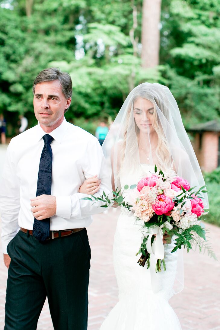 Jamie initially purchasing a veil only because her mother insisted on it, but it became her favorite bridal accessory. “I loved walking down the aisle with it draped over my face and then having my dad lift it over my head as he presented me my groom for the first time,” Jamie says.