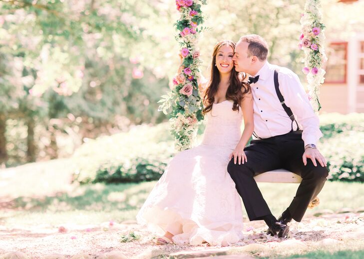 Anna and Michael took photos in a floral-adorned swing on Ashford Estate's property.