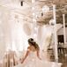 Bride Twirling in Wedding Dress Under Disco Ball