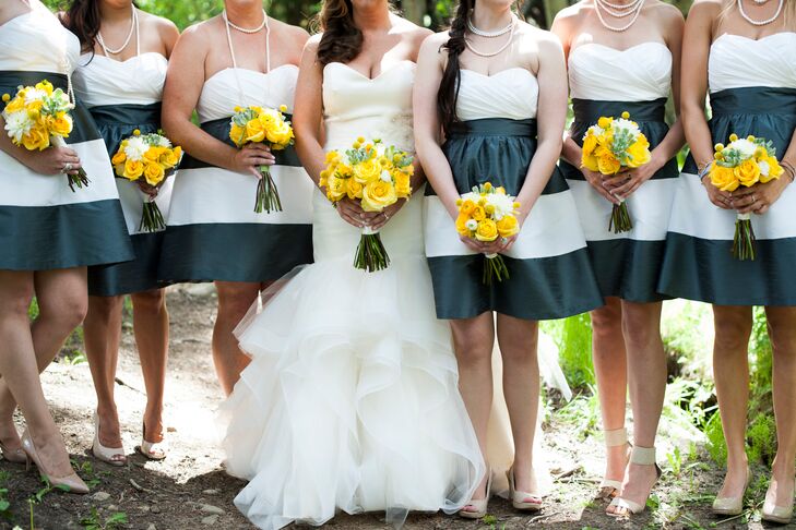 The bridesmaids wore strapless blue and white dresses from Bella Bridesmaids. “I loved the stripe,” Jessica says. “So different and fun.”