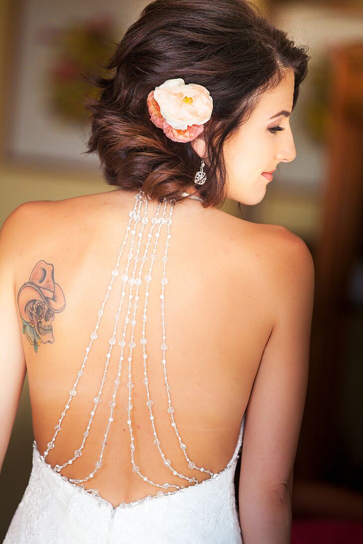 "I stopped in at this bridal shower randomly during the week and found THE ONE," Veronica says. "It had lace and was tight-fitting with an open back that had beading falling down the back."