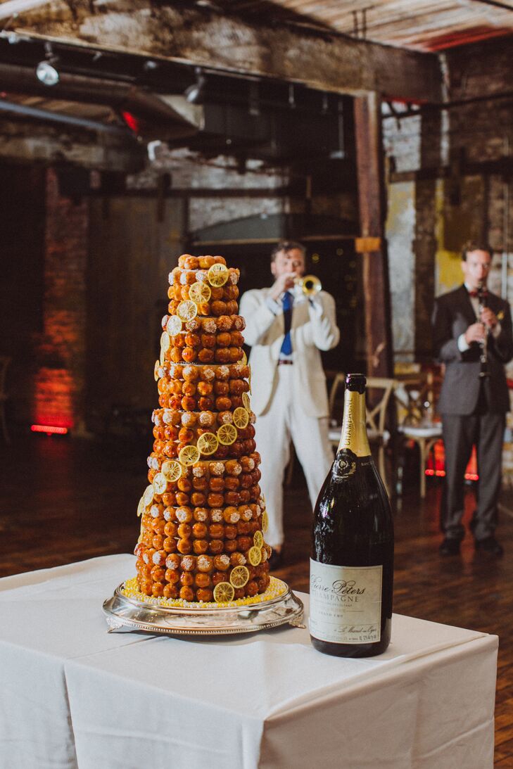 “I wanted to incorporate a traditional French element into our wedding and found the perfect place: cake time,” Candice says. For a twist, the couple opted for a traditional French croquembouche in lieu of a classic fondant or buttercream confection. Playing off the affair’s subtle lemon theme, Candice and Edouard had the croquembouche’s choux filled with lemon curd and decorated with slices of candied lemon and pearl sugar.